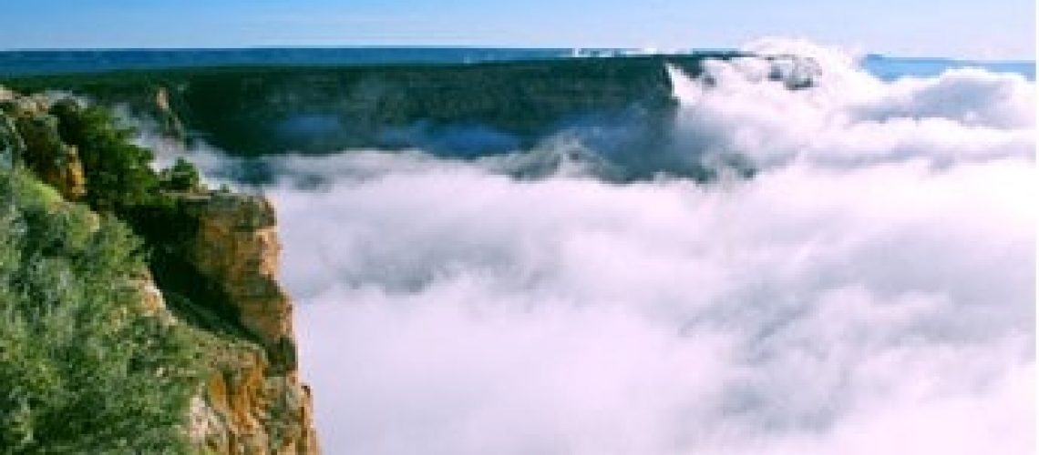 Temperature inversion at the Grand Canyon fills canyon with fog.
